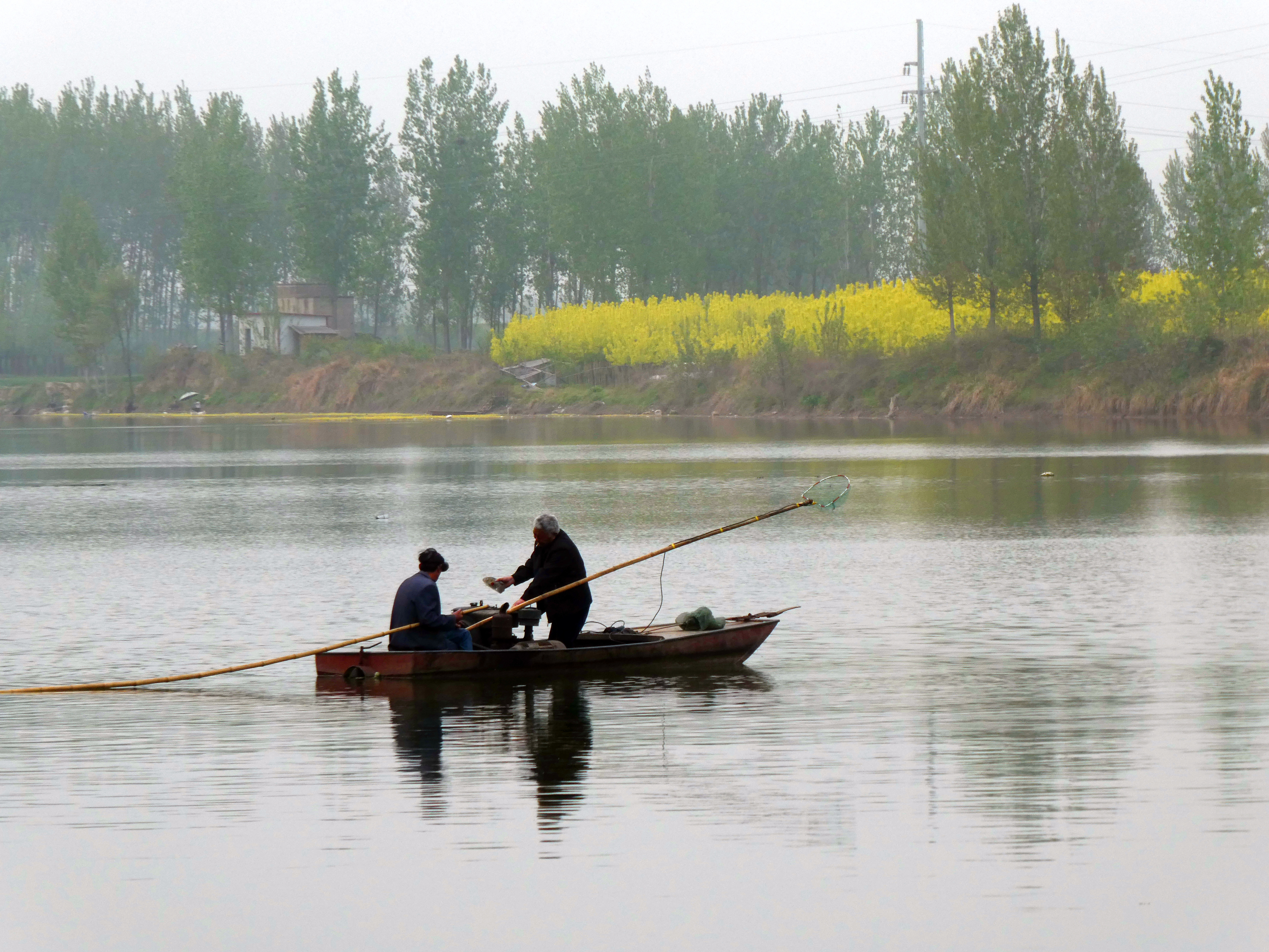 Fischer am Shaying-Fluss in China