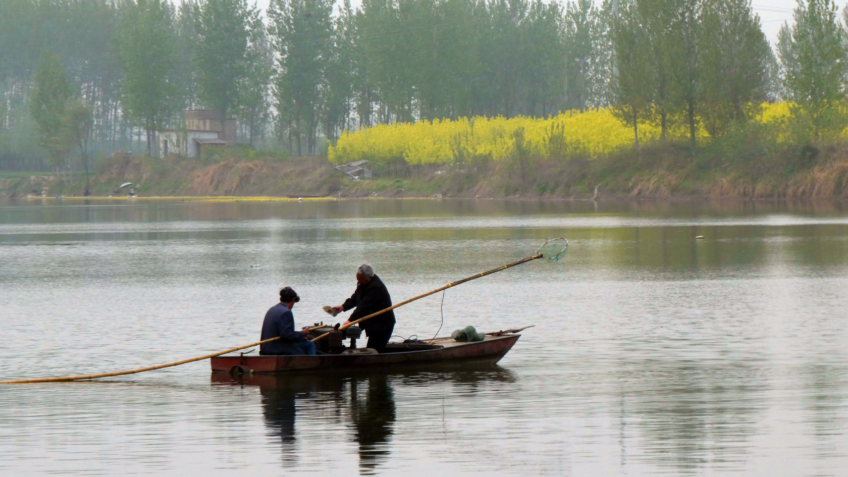 Fischer am Shaying-Fluss in China