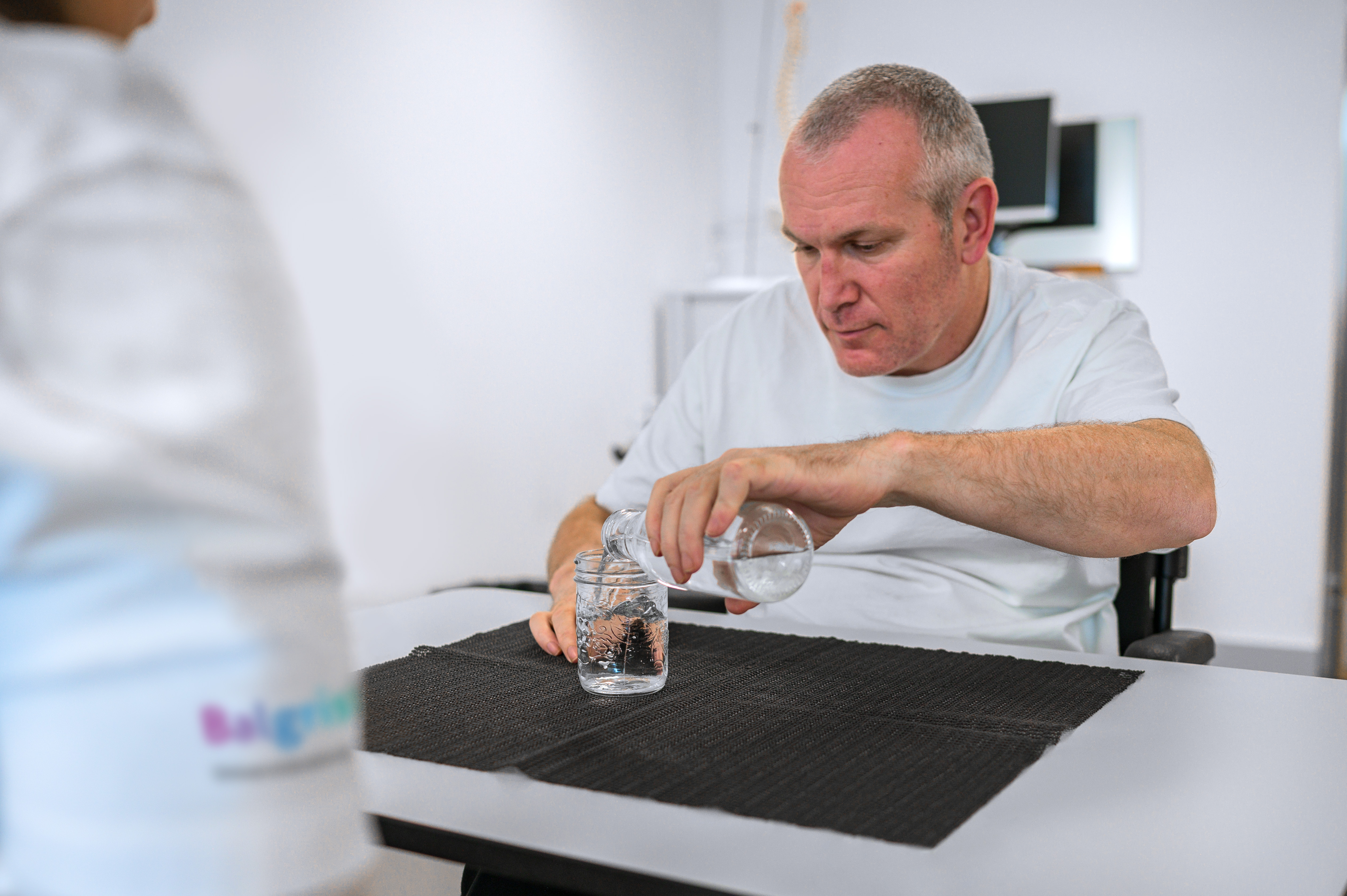 A patient treated with the NG101 antibody during occupational therapy.