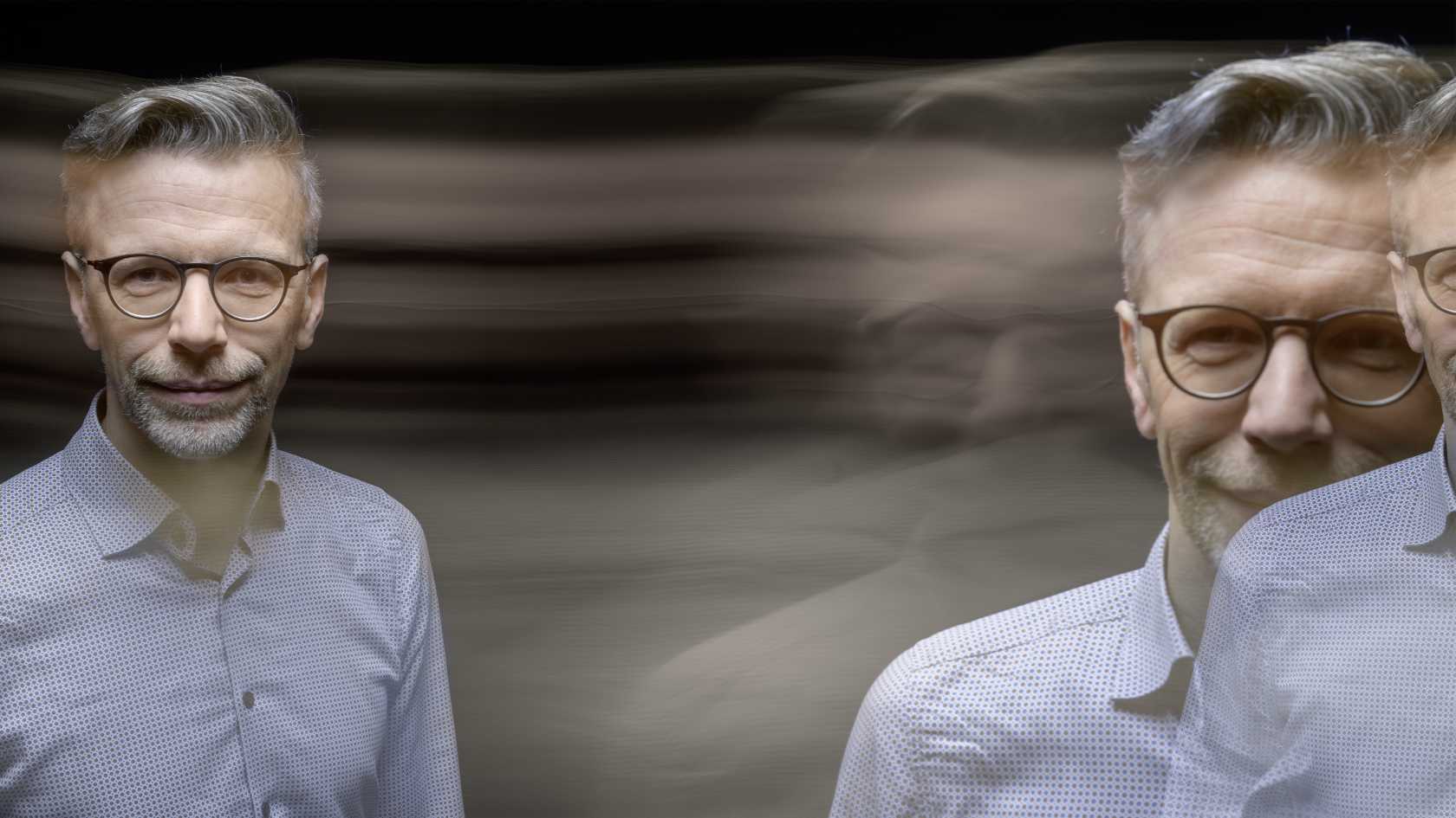 Three superimposed portrait images of Titus Neupert